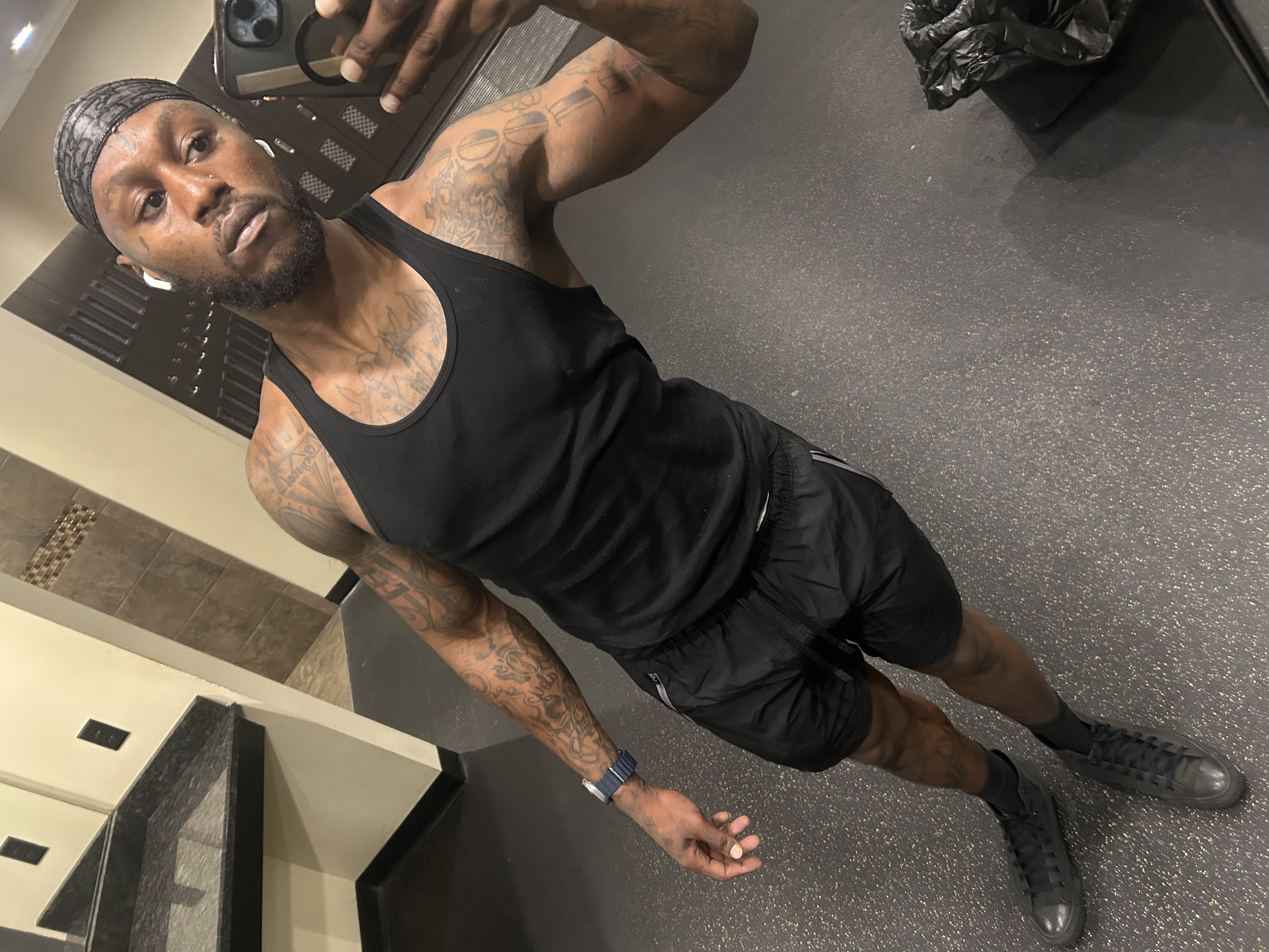 Sahun Rattary in a black tank top at the gym