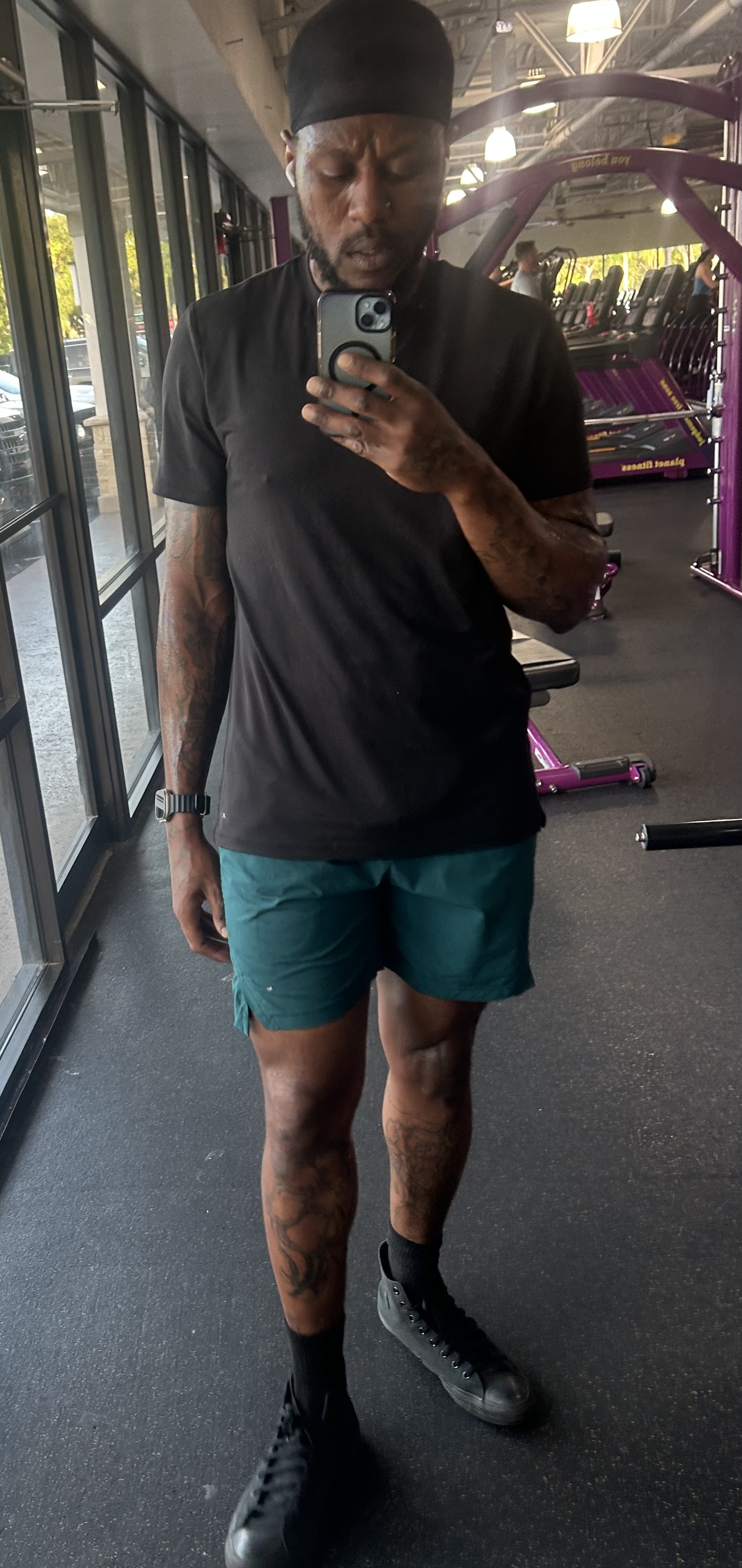 Sahun Rattary, personal trainer, standing in the gym